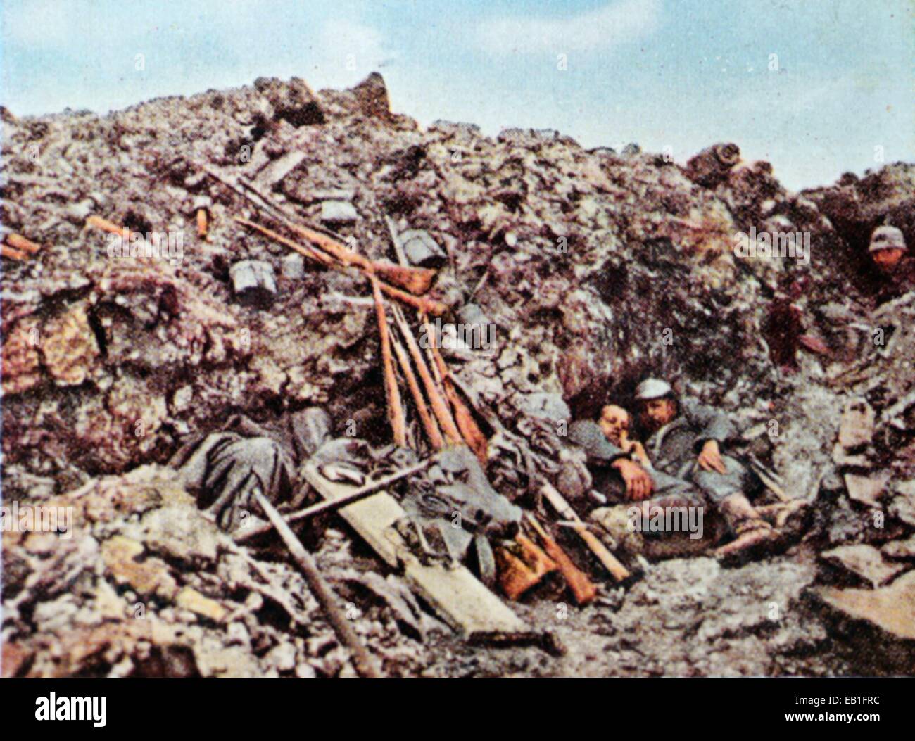 The contemporary colorized German propaganda photo shows German soldiers taking cover before enemy fire during the battle of Verdun, 1916. The battle of Verdun between the German Empire and France lasted from 21 February until 20 December 1916. It became a symbol of the tragic pointlessness of trench warfare for the Germans and French. Photo: Neumann Archive - NO WIRE SERVICE Stock Photo