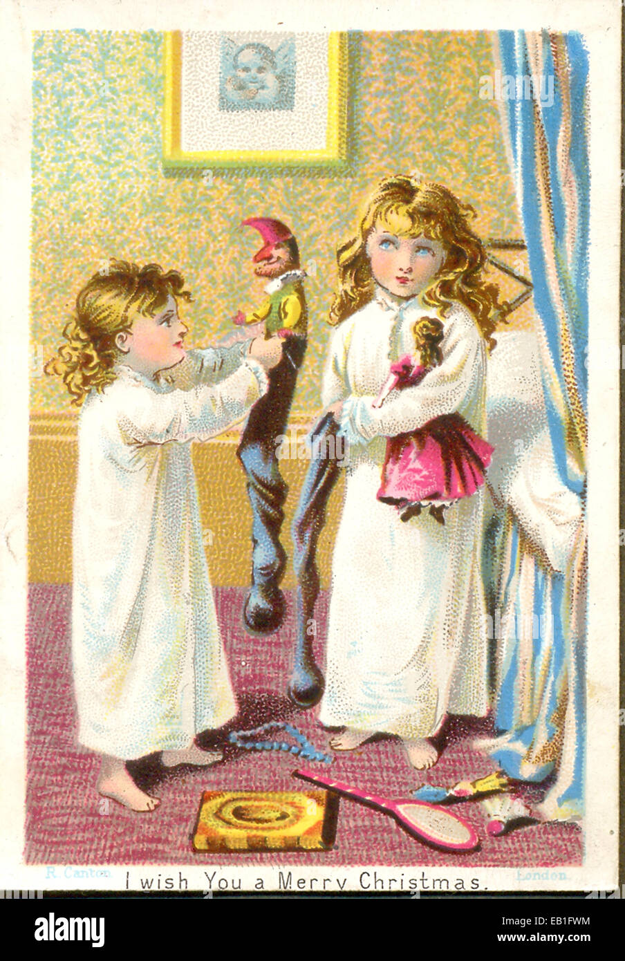 Chromolithographed Victorian greeting card with two girls opening their Christmas stockings 1870 Stock Photo