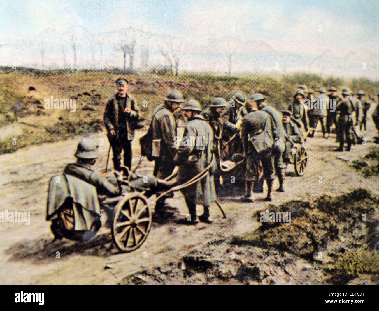 The contemporary colorized German propaganda photo shows French soldiers captured by German troops transporting German wounded uses canon carts behind the front, date and location unknown (1914-1918). Photo: Neumann Archive - NO WIRE SERVICE Stock Photo