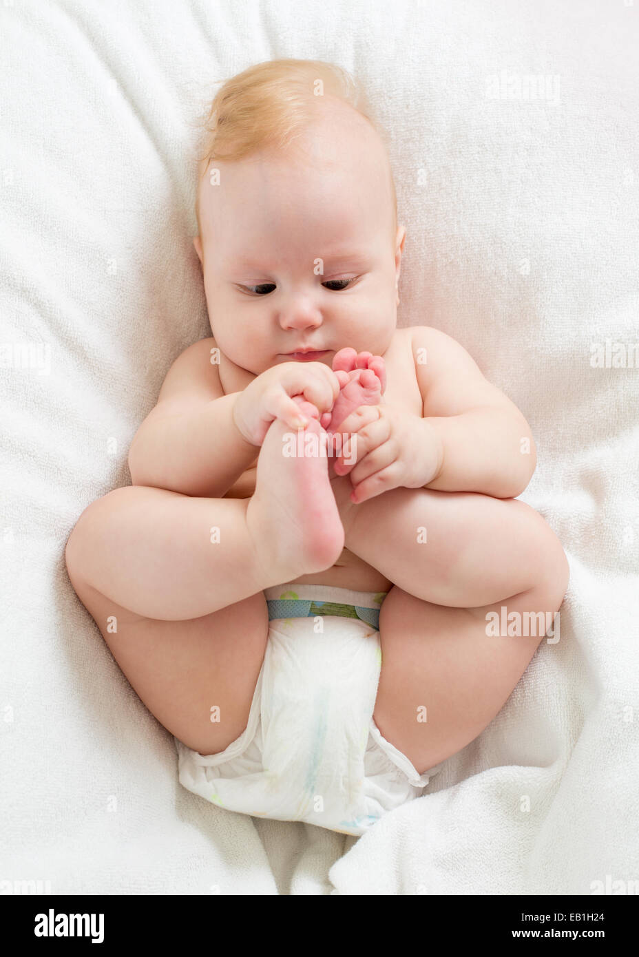 Cute boy bed feet hires stock photography and images Alamy