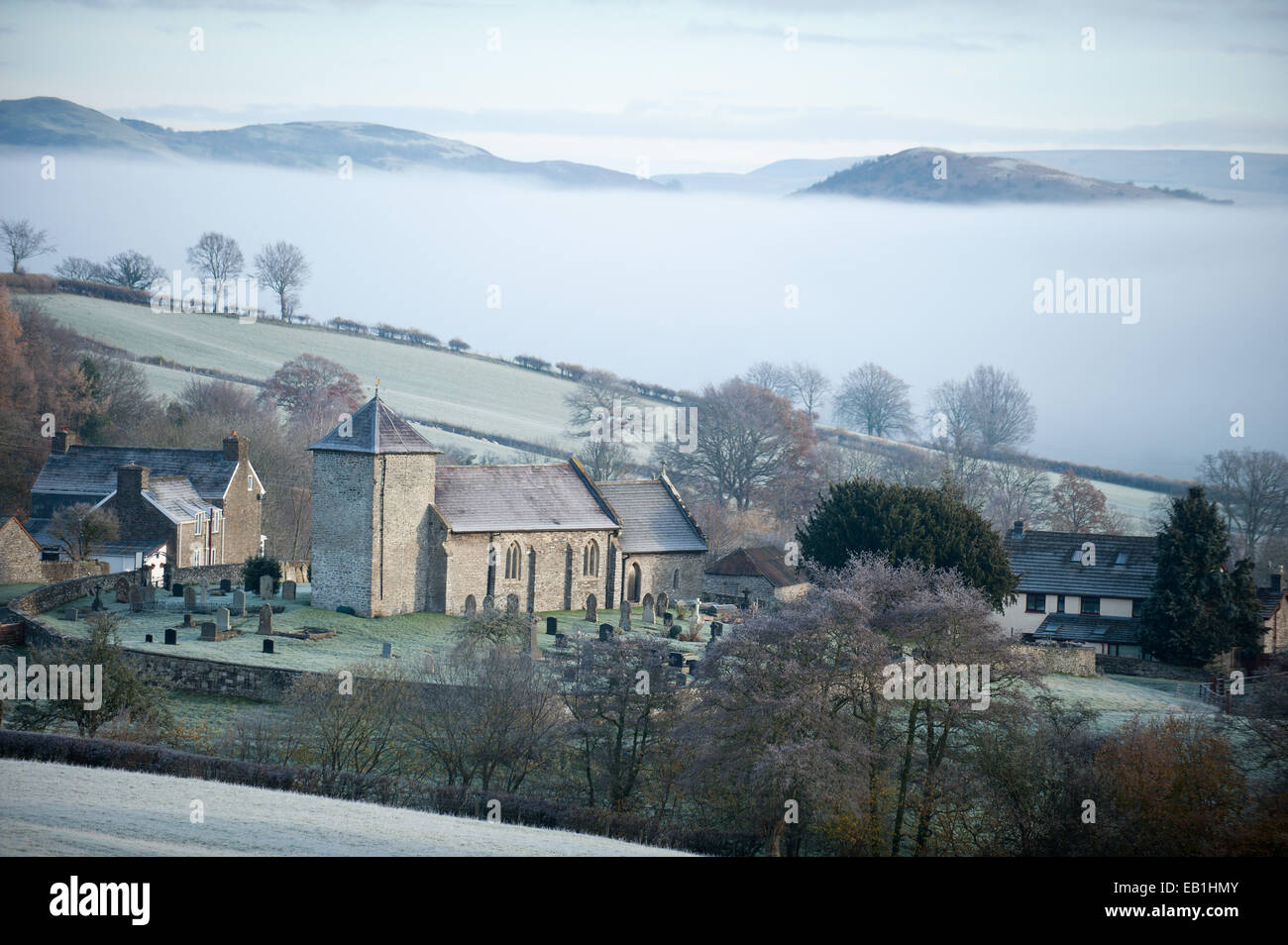 Llanddewi'r Cwm, Powys, UK. 24th November 2014. After a cold night with temperatures dropping below zero the morning breaks to frost and mist in the valleys. Credit:  Graham M. Lawrence/Alamy Live News Stock Photo