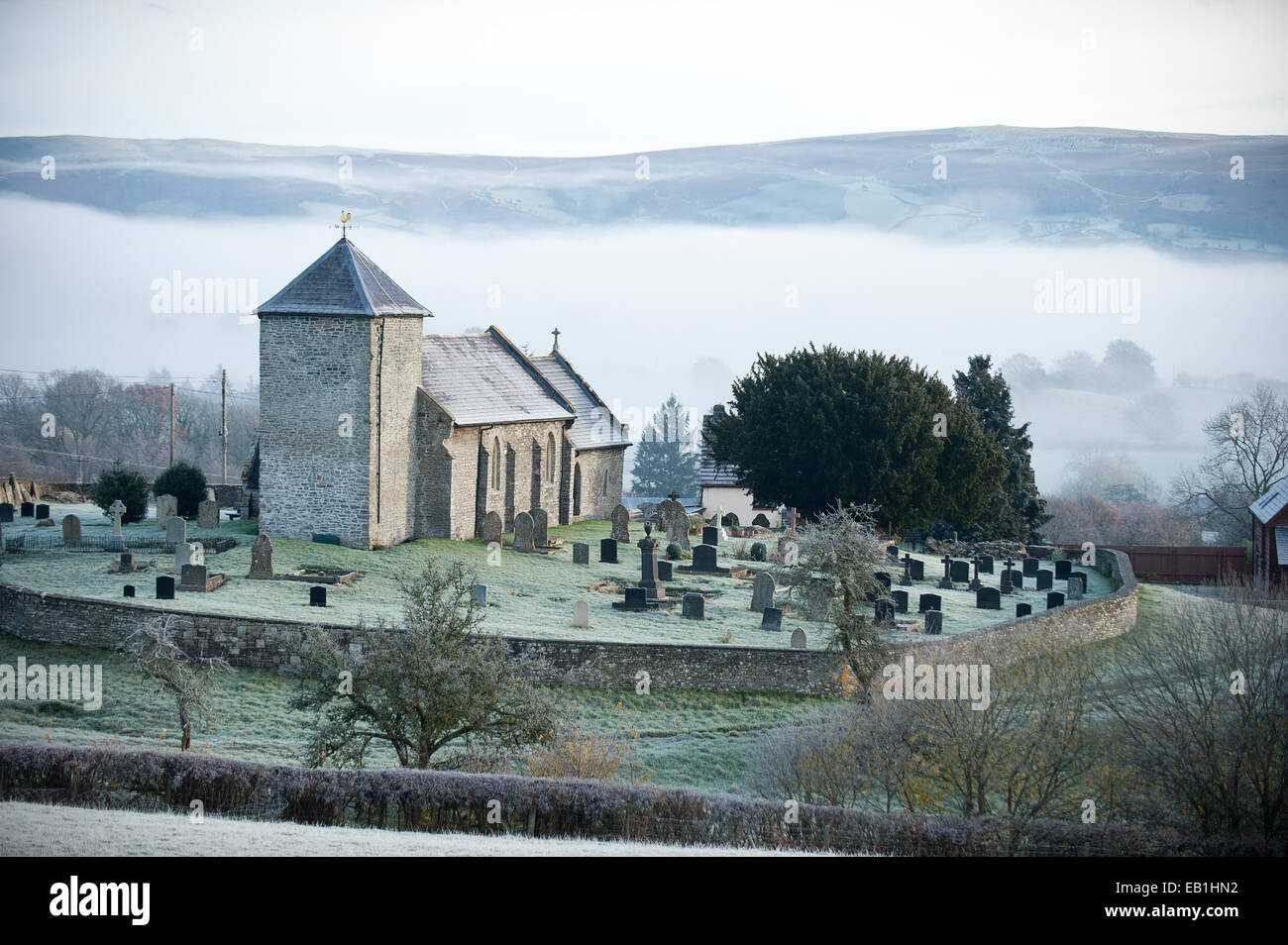 Llanddewi'r Cwm, Powys, UK. 24th November 2014. After a cold night with temperatures dropping below zero the morning breaks to frost and mist in the valleys. Credit:  Graham M. Lawrence/Alamy Live News Stock Photo