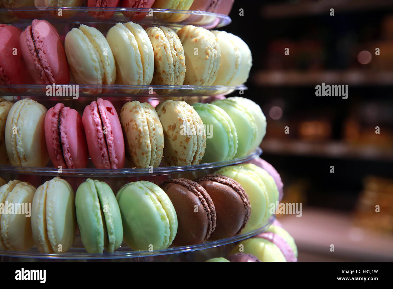 Colourful tasty macaroons in a row Stock Photo - Alamy