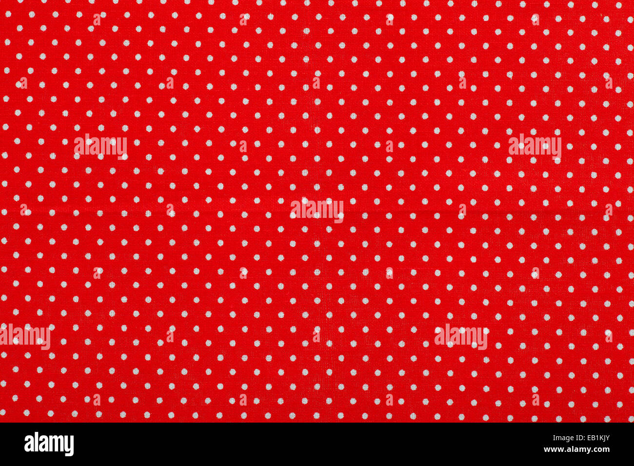 red polka dot fabric pattern Stock Photo