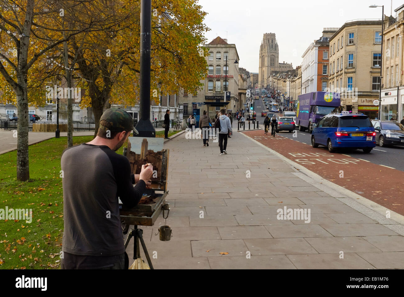 Bristol, England October 31st, 2014 An artist painting on a canvas