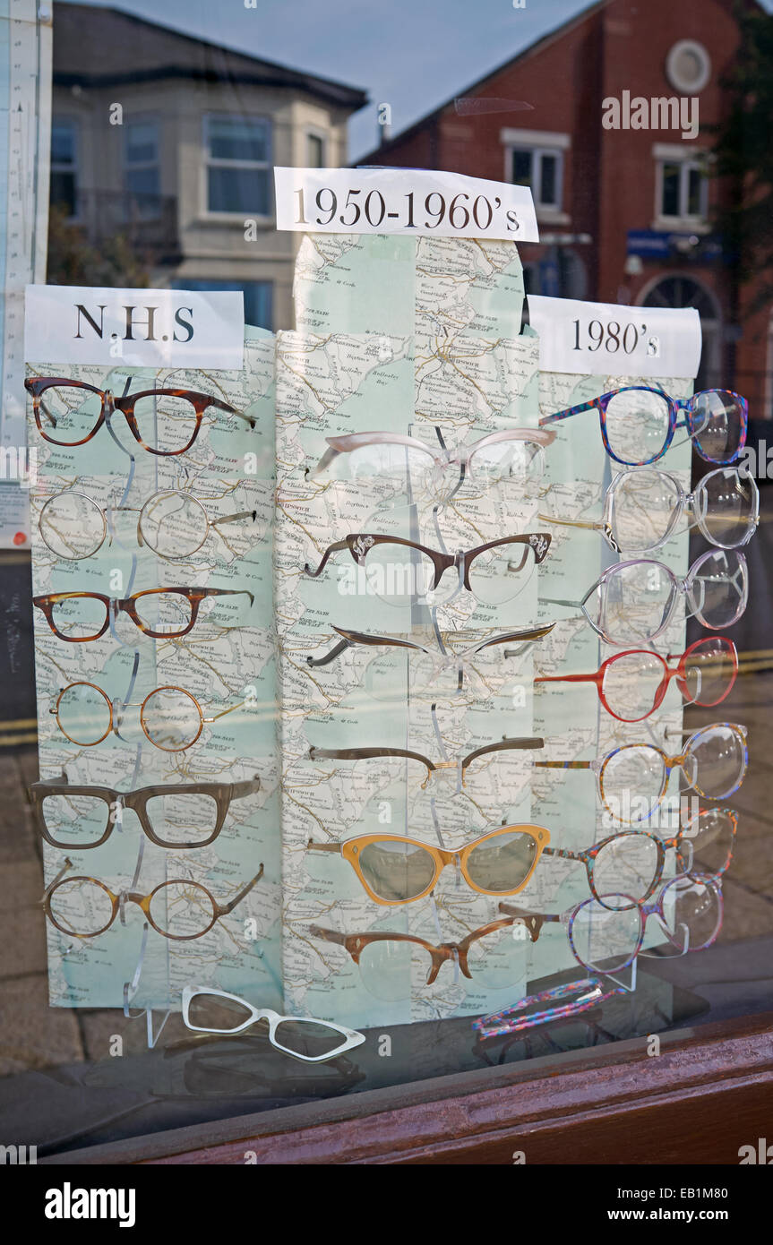 Opticians window display showing vintage glasses Stock Photo