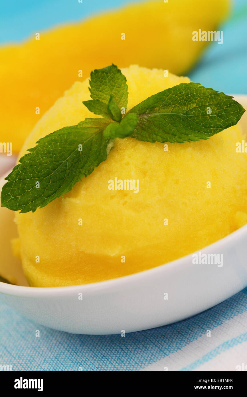 Mango sorbet garnished with mint leaf Stock Photo - Alamy Mango sorbet garnished with mint leaf Stock Photo - Alamy