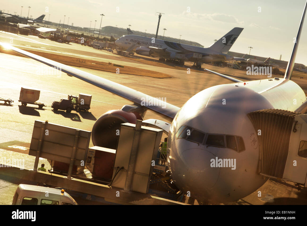 A plane being loaded at Heathrow airport, London Stock Photo