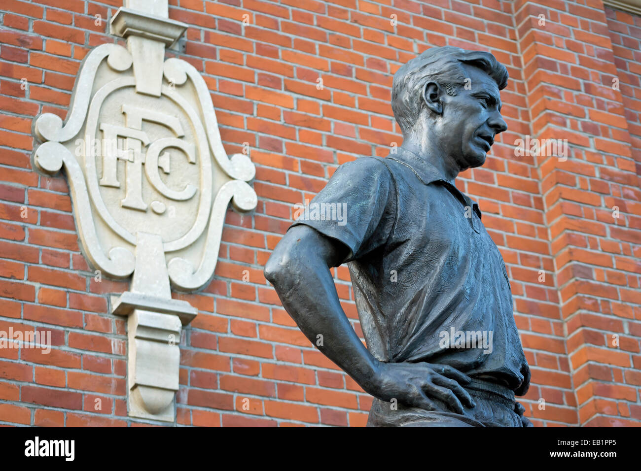 detail of the statue by douglas jennings of fulham and england footballer johnny haynes, craven cottage, fulham, london, england Stock Photo