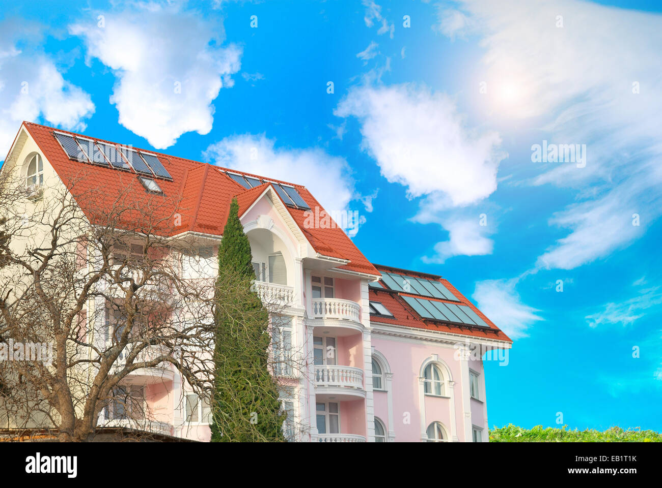 Modern house with solar panels on the roof Stock Photo - Alamy