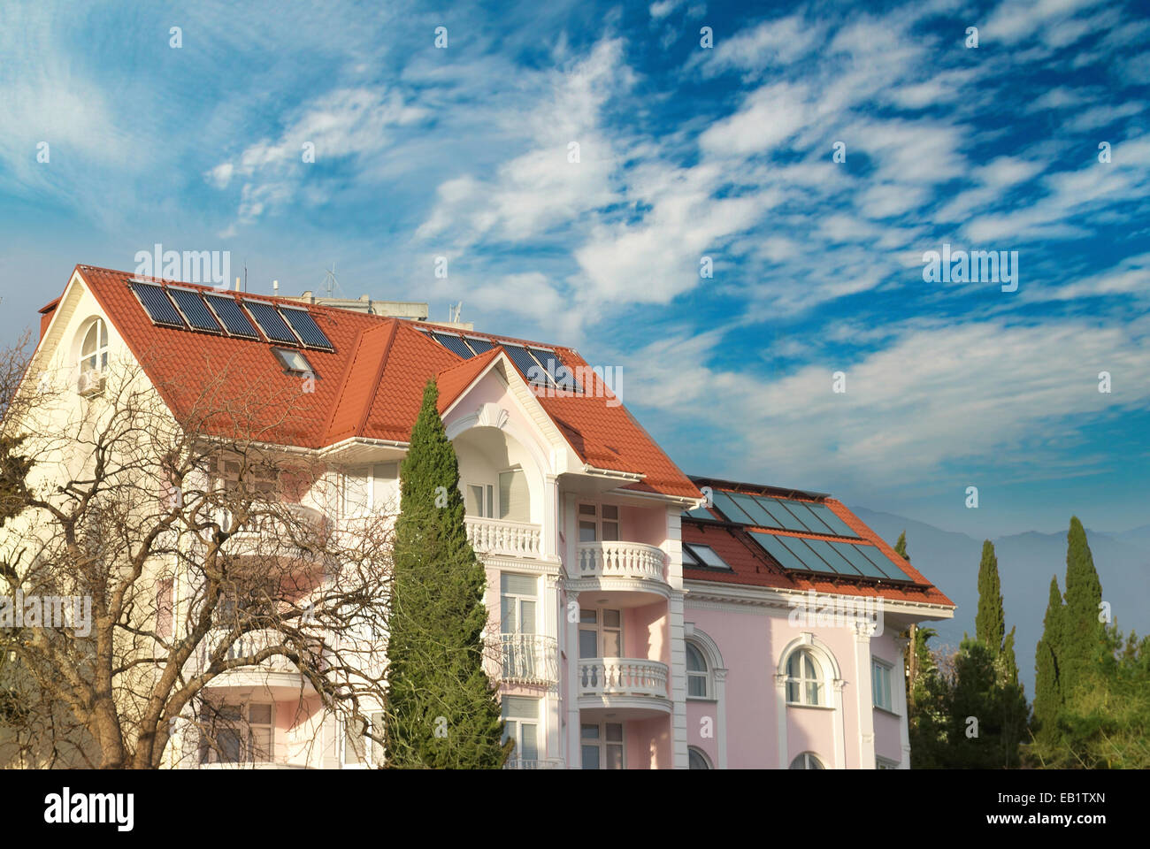 Modern house with solar panels on the roof Stock Photo - Alamy