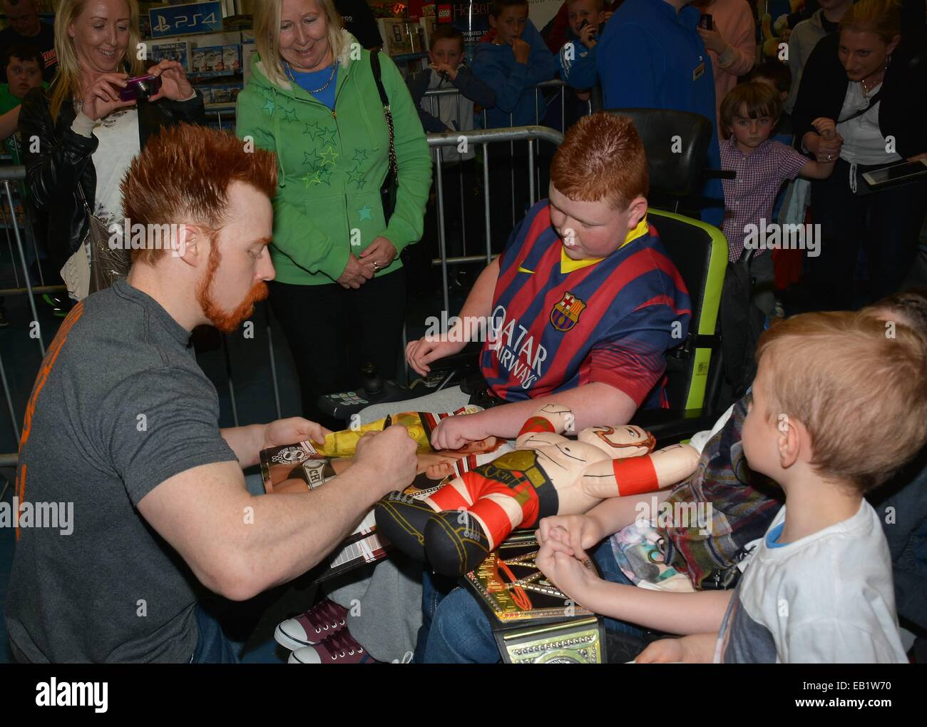 WWE Superstar & United States Champion Sheamus meets hundreds of fans at Smyths Toy Store on Jervis Street...  Featuring: Sheamus & fan Sean Rooney Where: Dublin, Ireland When: 22 May 2014 Stock Photo