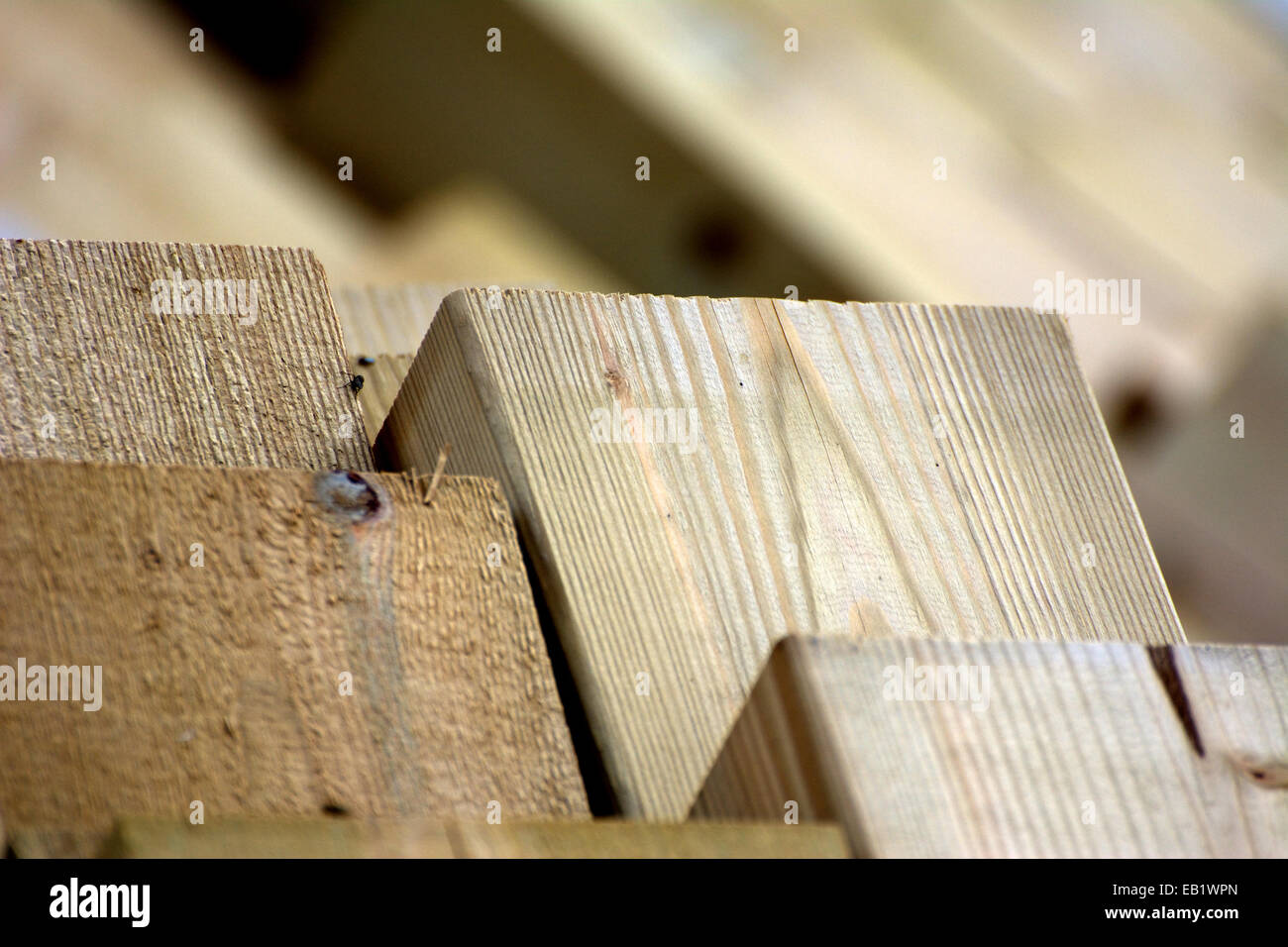 Lumber or timber stacked ready for use Stock Photo - Alamy