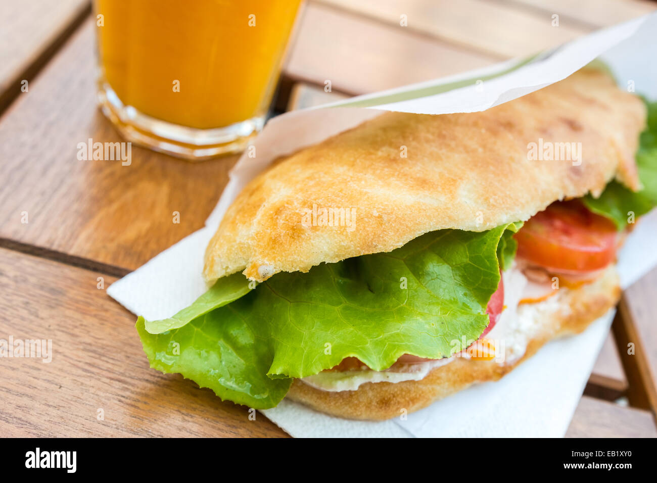 Salad Sandwich With Tomato Slices And Orange Juice Stock Photo Alamy