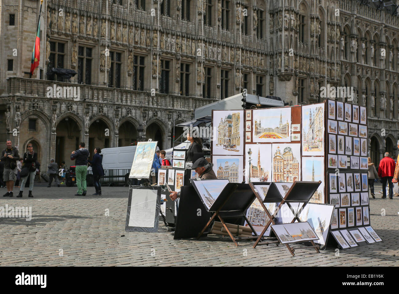 artist selling art work Grand Place brussels belgium Stock Photo Alamy