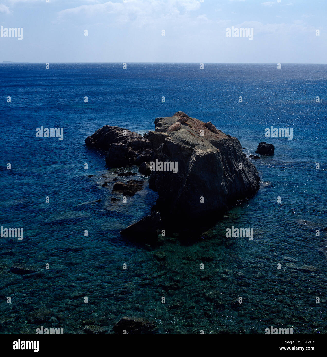 See With Rocks A rock in a see Stock Photo - Alamy