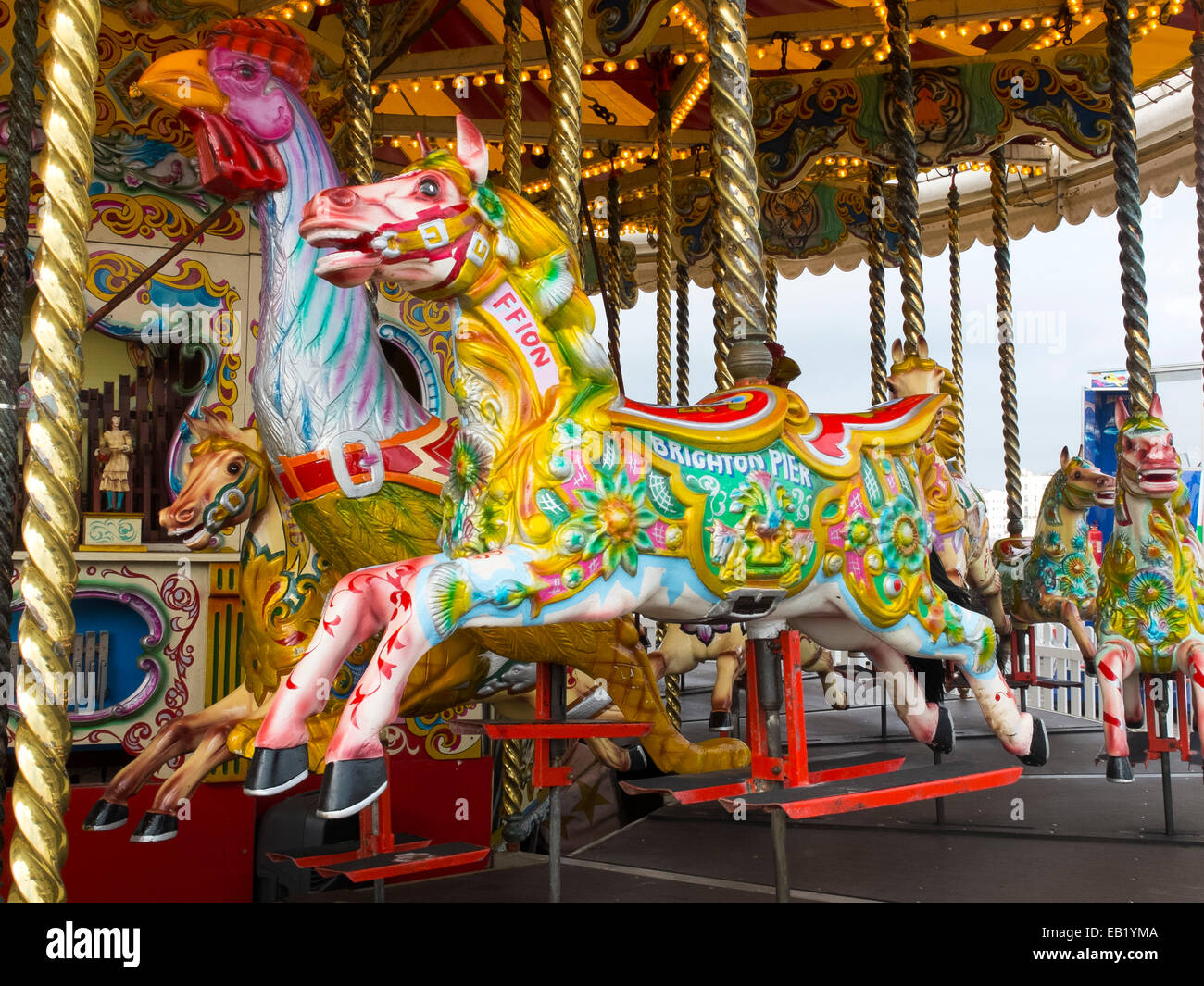 A waltzing horse on one of the fairground rides on Brighton Pier Stock Photo