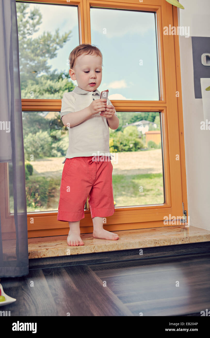 a 1,5 years old boy in the kitchen Stock Photo Alamy