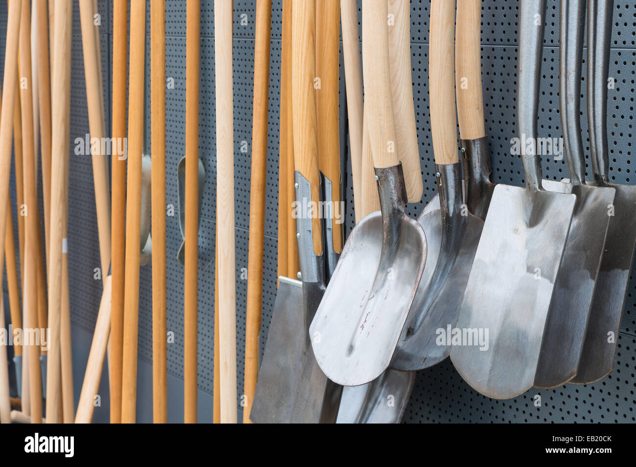 Garden shop with wooden spades for sale Stock Photo