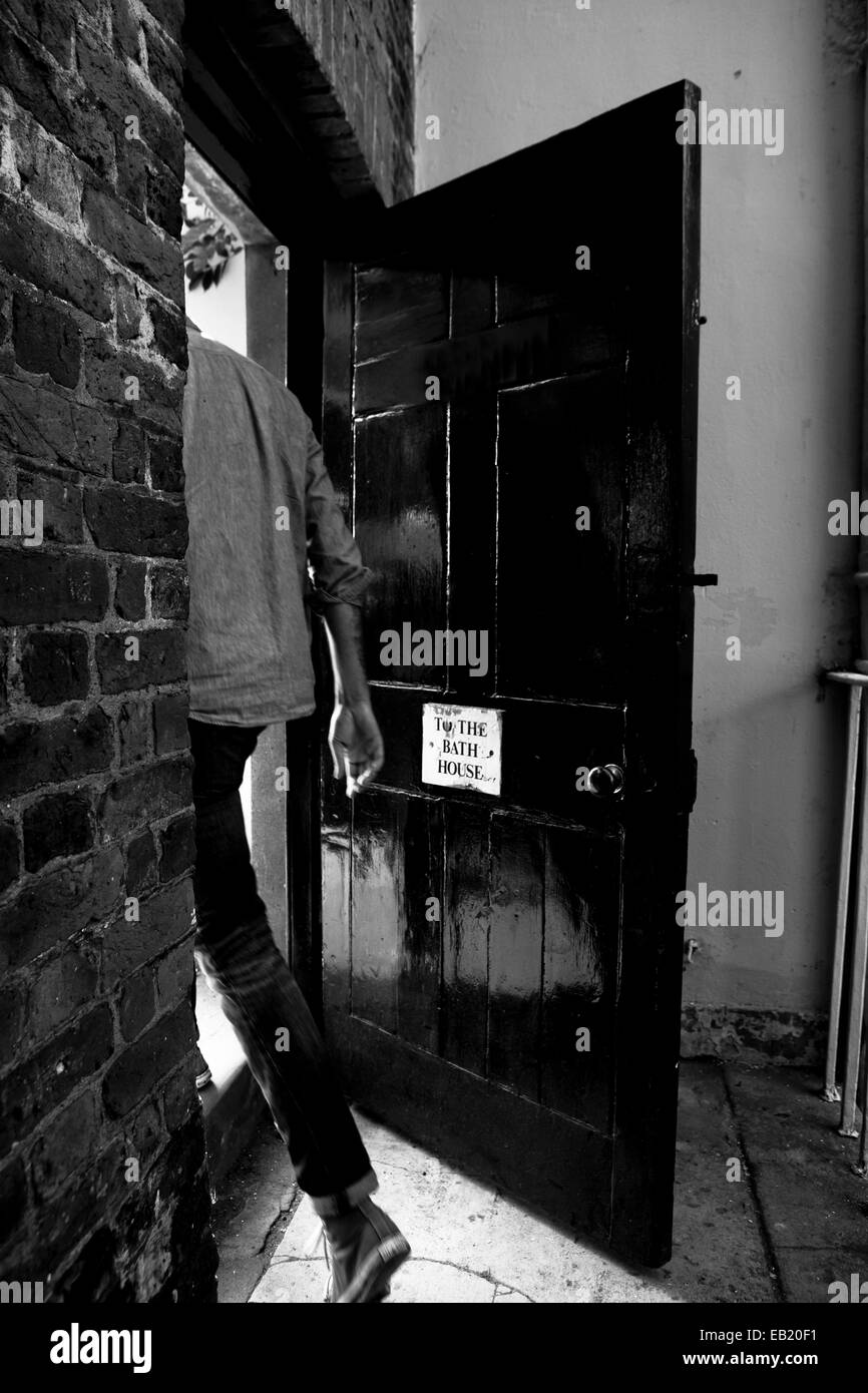 Man walking through door hi-res stock photography and images - Alamy
