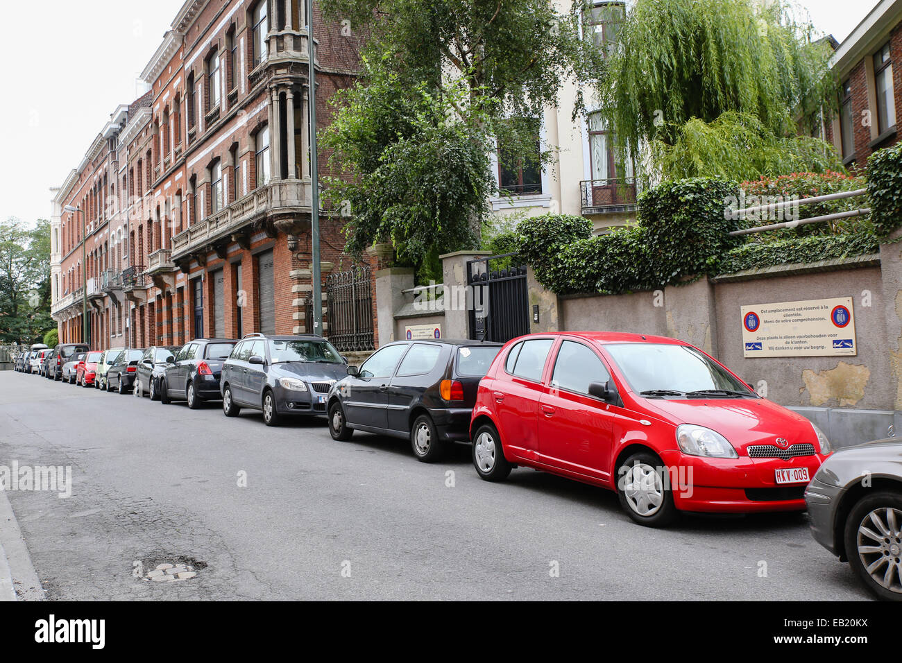 small cars parked street europe brussels belgium Stock Photo Alamy