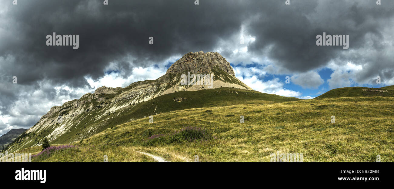 Thunderstorm formation over Mount Castellazzo, Dolomites Stock Photo