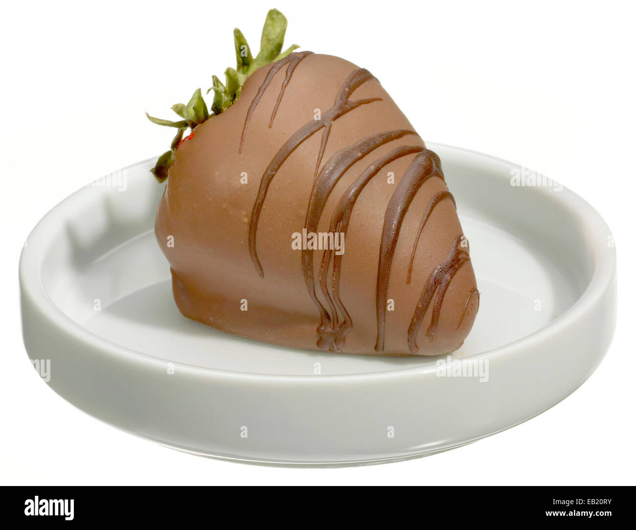 chocolate covered strawberry on a white dish Stock Photo