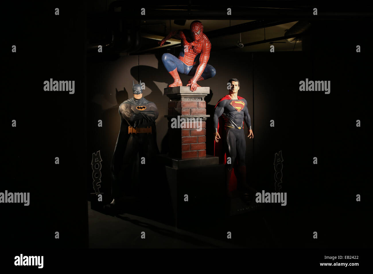 batman spiderman superman figures inside moof brussels Stock Photo