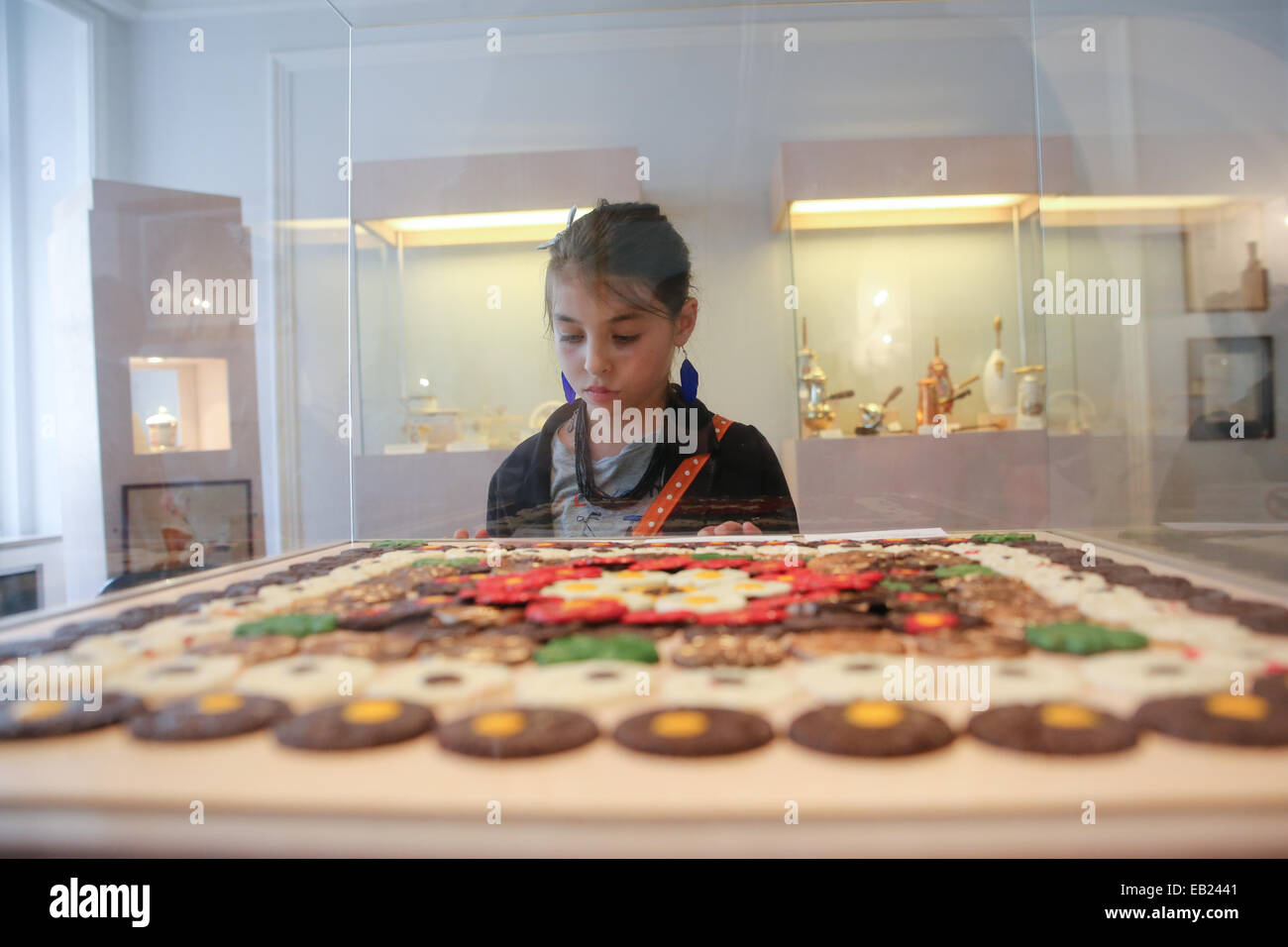 young girl kid looking chocolate display europe Stock Photo