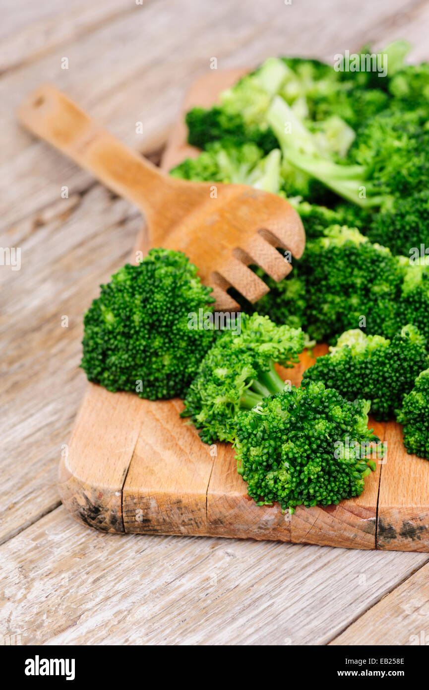Broccoli on cutting board Stock Photo