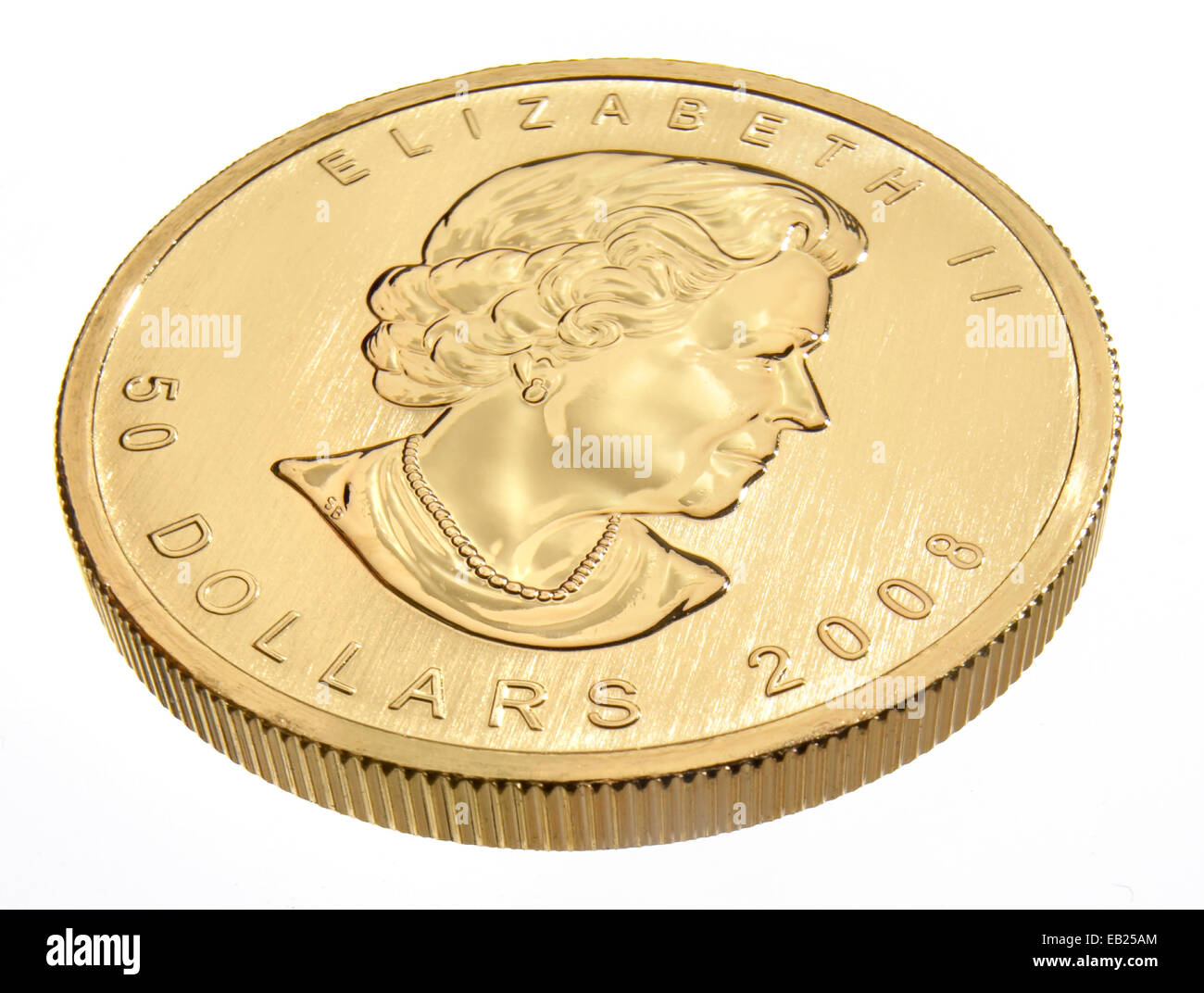 Royal Canadian Mint 1 ounce gold coin top side. .9999 pure gold, isolated on white, silo, silhouette, cut out, no background Stock Photo