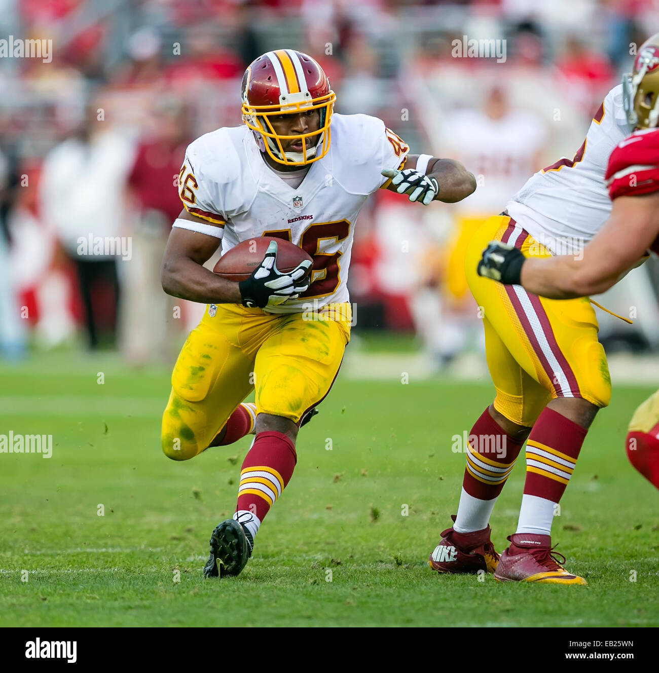 San Francisco, CA. 23rd Nov, 2014. San Francisco 49ers free safety Eric  Reid (35) tries to pump up the crowd during the NFL football game between  the Washington Redskins and the San