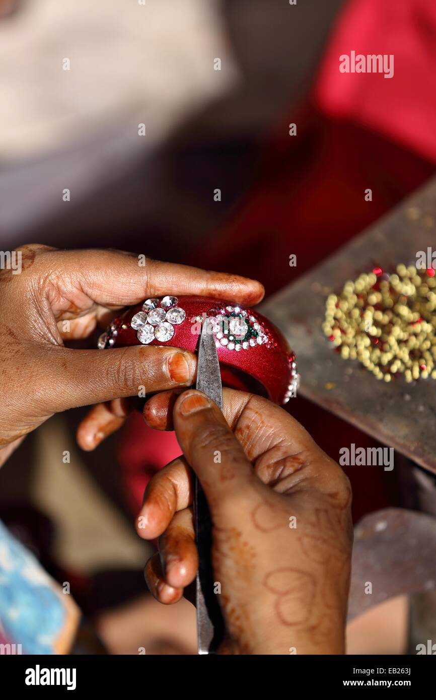 Indian woman working in a bangles factory India Stock Photo