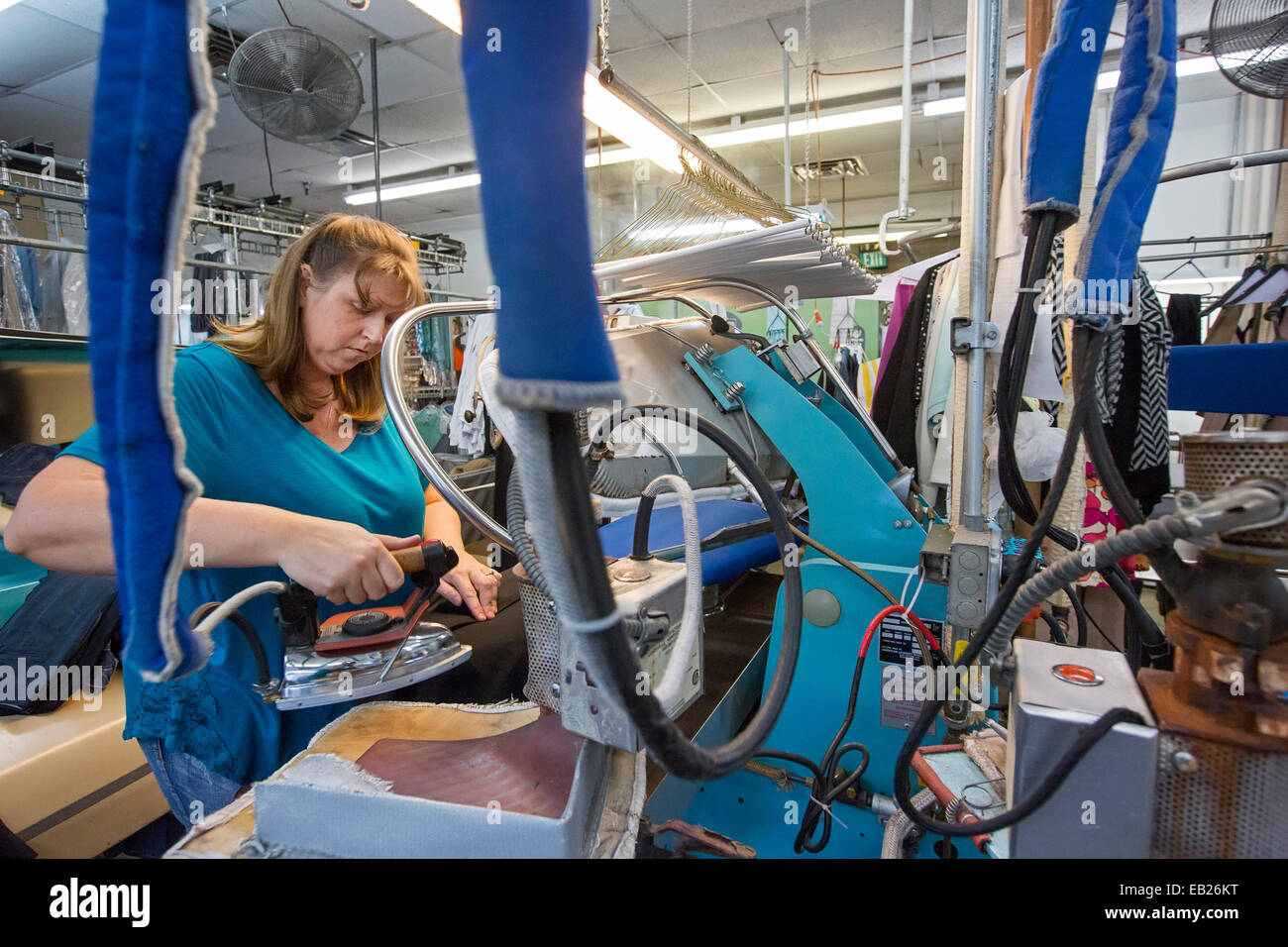 Broomfield, Colorado A worker at Lionheart Cleaners, a laundry and