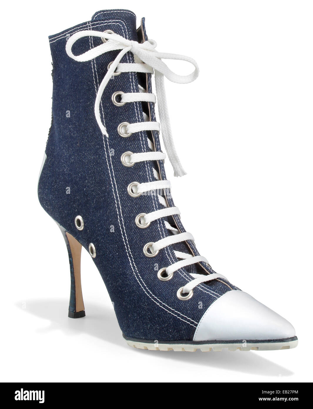 manolo blahnik denim high heeled work boot photographed on a white background Stock Photo