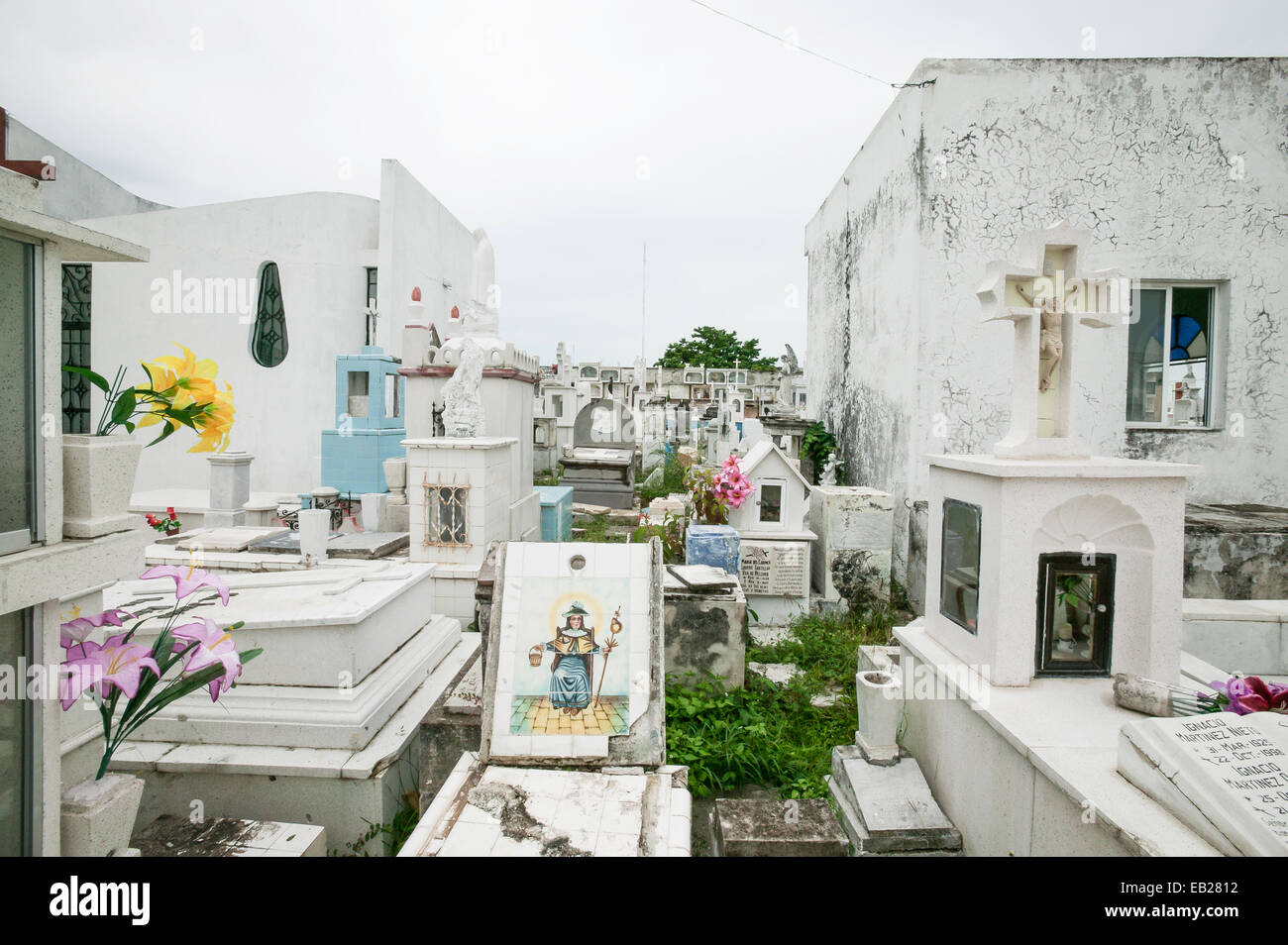 Panteon de San Roman cemetery with above white ground graves, various types of grave markers, vaults, and decorative tile, Campeche, Mexico. Stock Photo