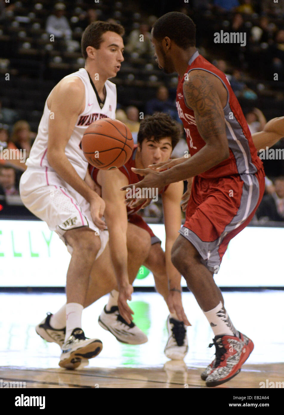 November 24, 2014:Nicholls State Colonels forward Luka Kamber (44) Middle passes the ball to Nicholls State Colonels guard Richie Lewis (12) in the second half at the LJVM Coliseum in Winston-Salem, NC. PJ Ward-Brown/CSM Stock Photo