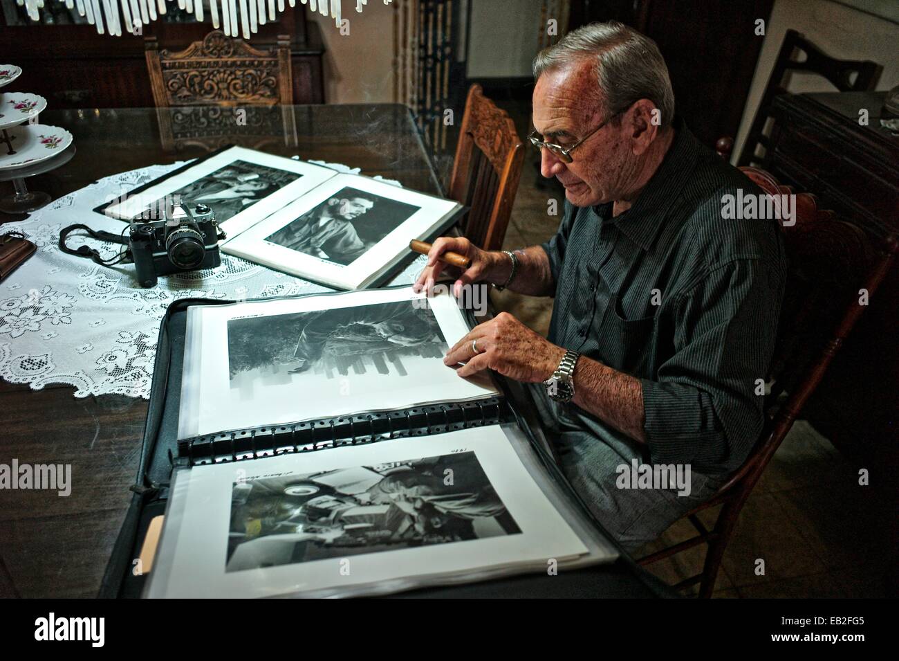 Cuban photographer Liborio Noval, born in 1936, and one of the most iconic photographer of the Cuban Revolution, at his home in Havana. He died in 2012. Stock Photo