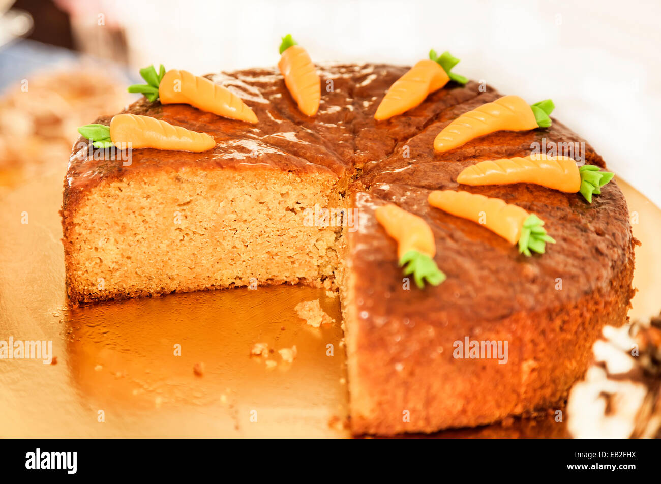 Carrot cake decorated with carrots on the top Stock Photo