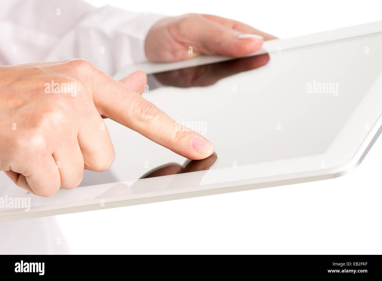 Woman using tablet computer isolated on white background Stock Photo ...
