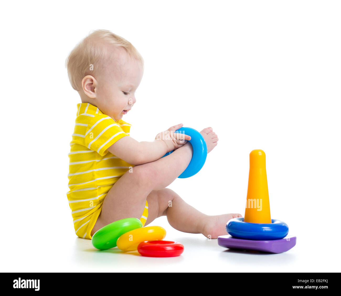 funny baby boy playing with colorful toy Stock Photo Alamy