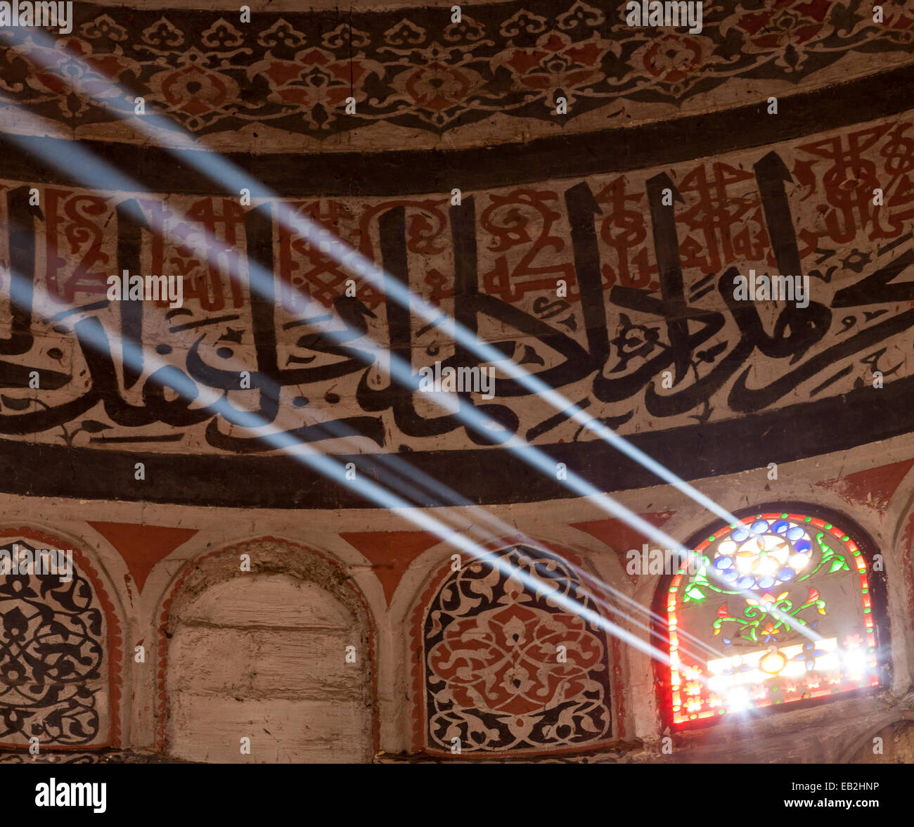light rays in mausoleum window, complex of Faraj ibn Barquq, Northern Cemetery, Cairo, Egypt Stock Photo