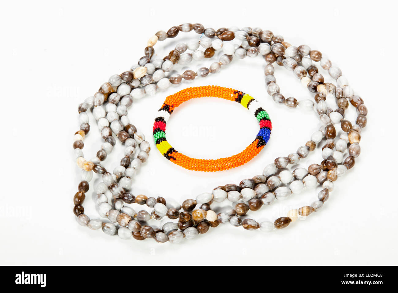 beaded Zulu necklace with bright orange armband Stock Photo