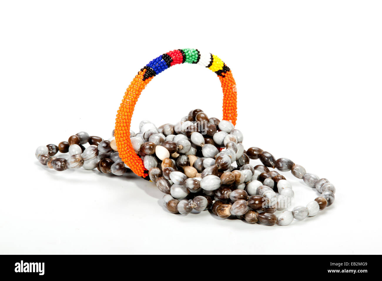 coiled Zulu beaded necklace with bright orange armband Stock Photo