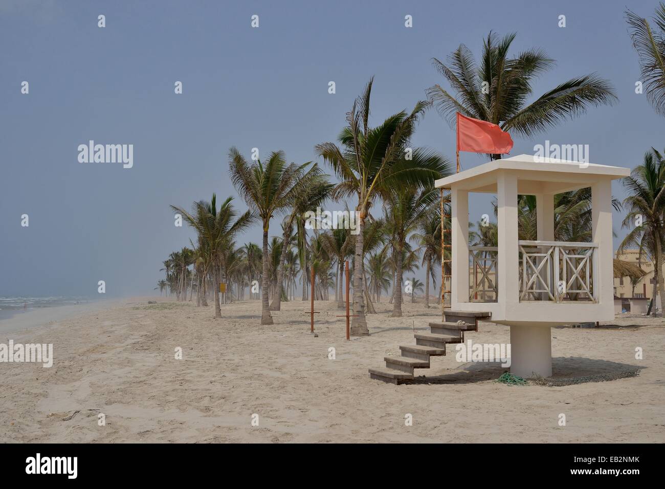 Red flag, bathing is prohibited, on Salalah Beach, Salalah, Dhofar Region, Oman Stock Photo