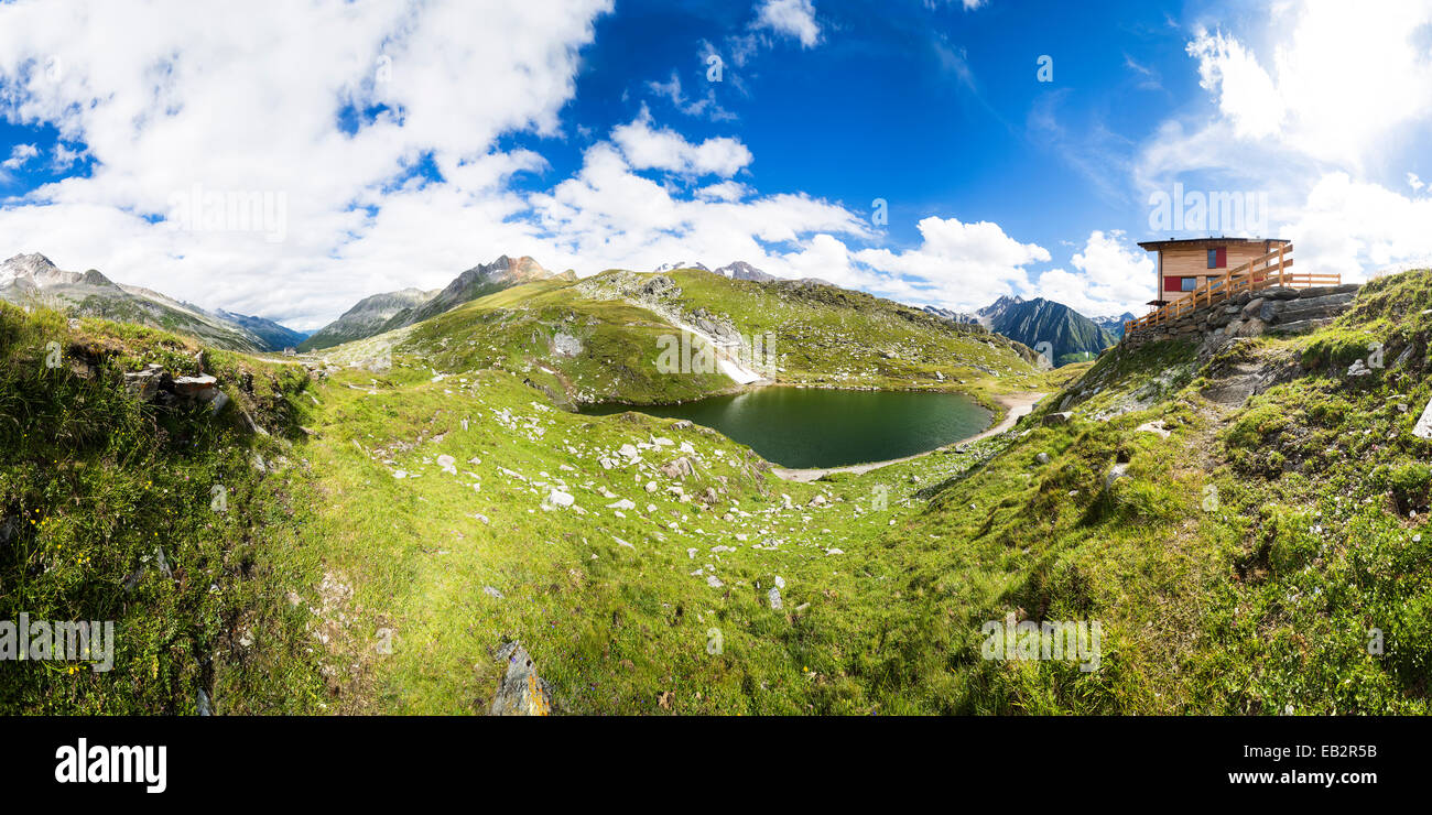Mountain landscape with a lake, Pfitscher Joch ridge, South Tyrol province, Trentino-Alto Adige, Italy Stock Photo