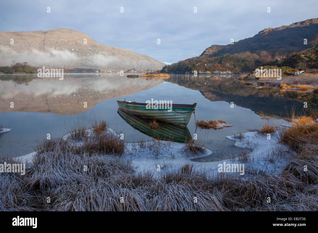 Frosty fishing boat on the shore of Upper Lake, Killarney National Park, County Kerry, Ireland. Stock Photo