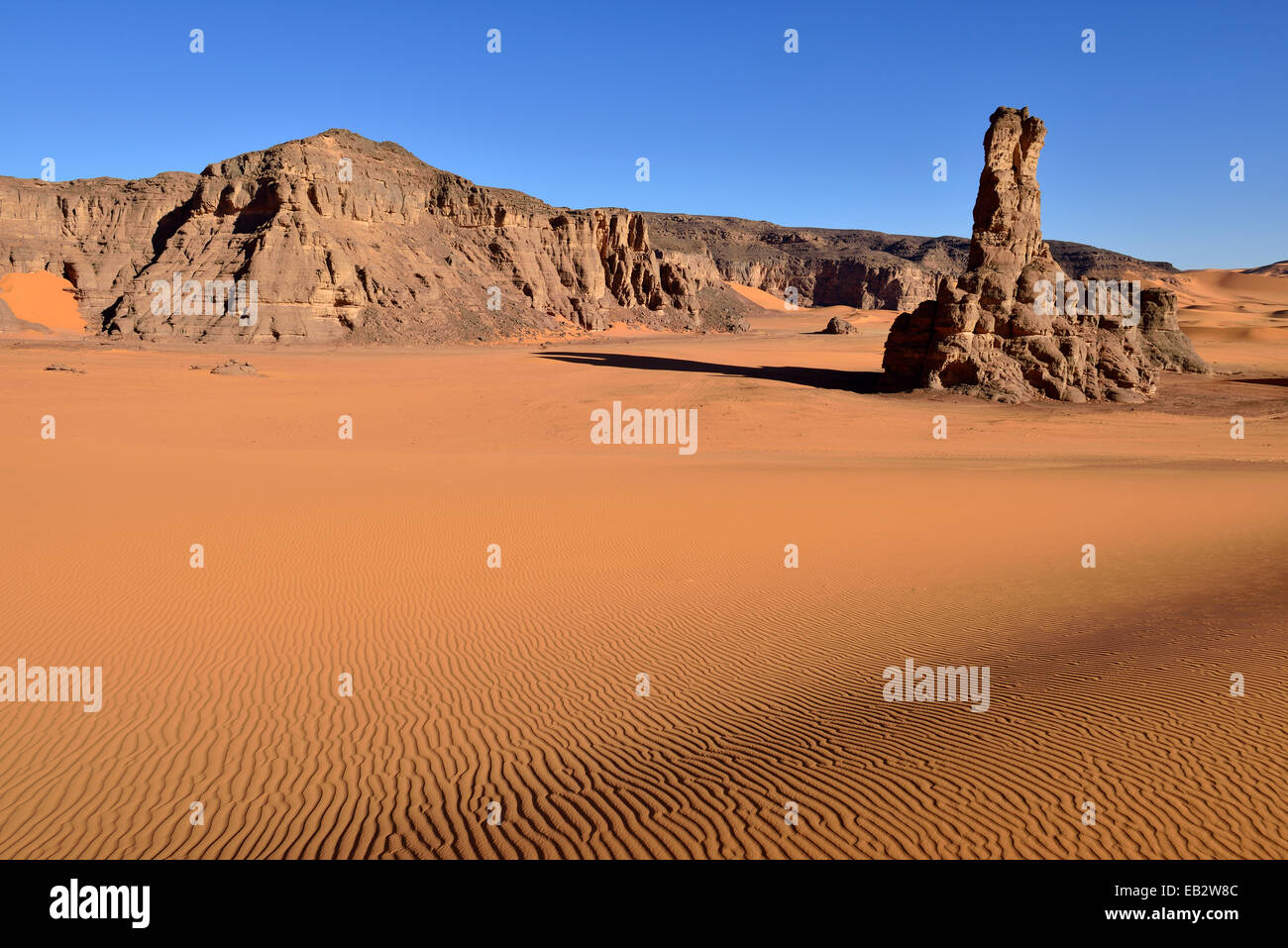 Sand dunes and rocks of Moul Naga, Tadrart, Unesco World Heritage Site Tassili n' Ajjer National Park, Sahara desert, Algeria Stock Photo