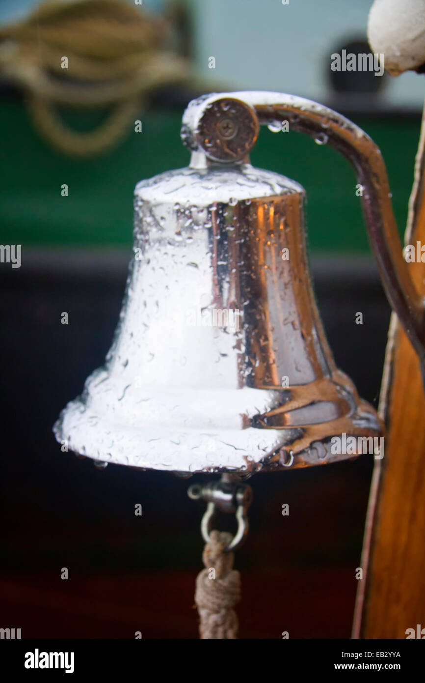 Ship's bell on the 19th century Dutch sailing barge Twee Gebroeders, Pin Mill, Suffolk, UK Stock Photo