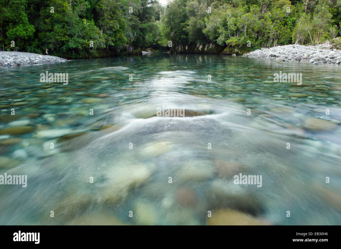 Clear, cold trout waters of the Huequi River in the Northern Patagonia region of Southern Chile. Stock Photo